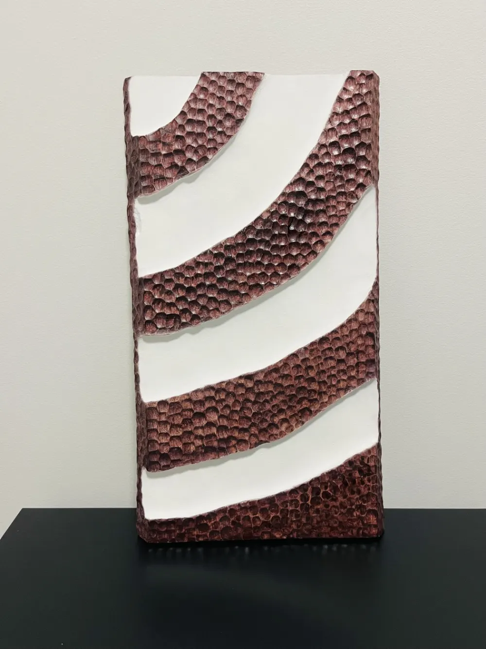Wood wall art with circular pattern